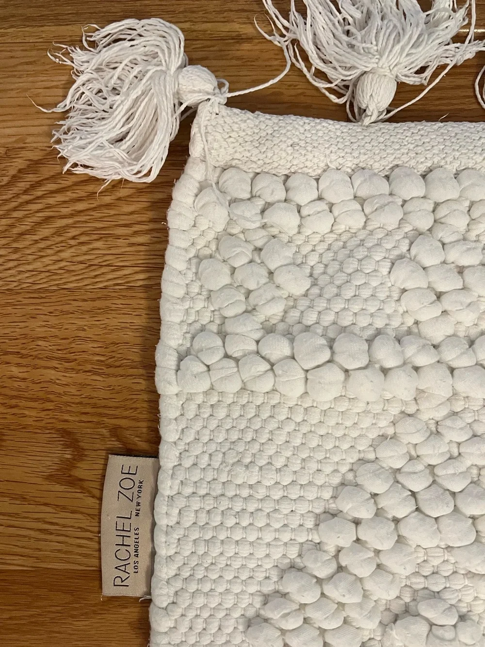 Rachel Zoe white accent rug w/ diamond-lattice texture & tassels 24 x 27